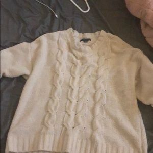 A knitted American eagle sweater hardly warn